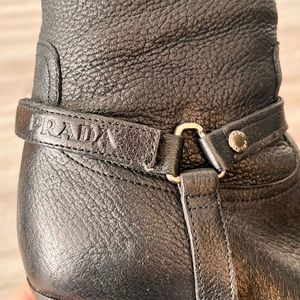 Prada Knee-High Pebbled Leather 4” Heeled Boots